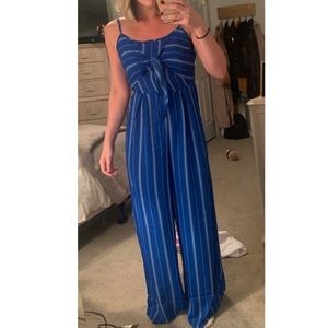 Never worn open back blue jumpsuit